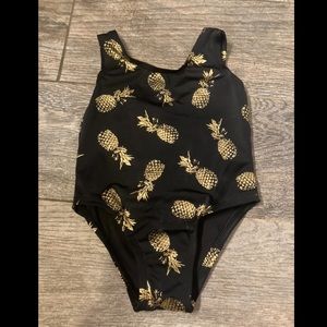 City Streets 3-6M black one piece with gold pineapples